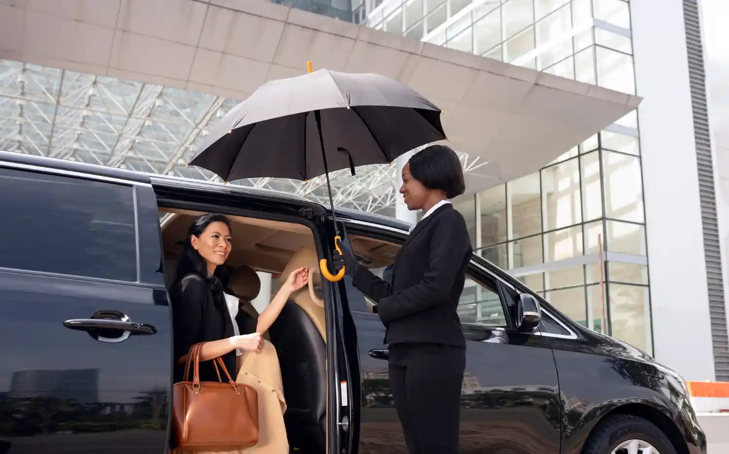 Professional airport chauffeur service with luxury car, WiFi, charging ports and comfortable travel experience