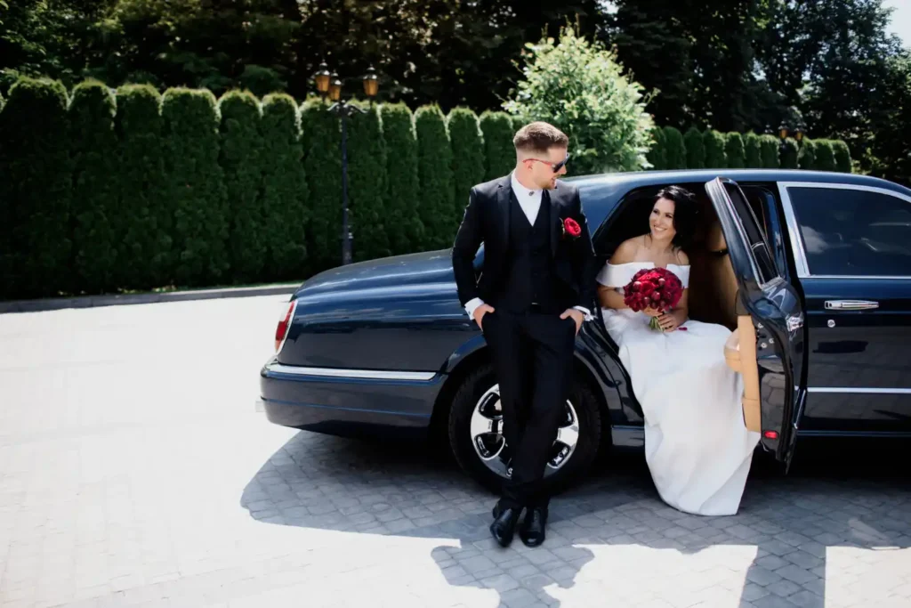 Luxury wedding car with bride arriving at wedding venue in Aldershot